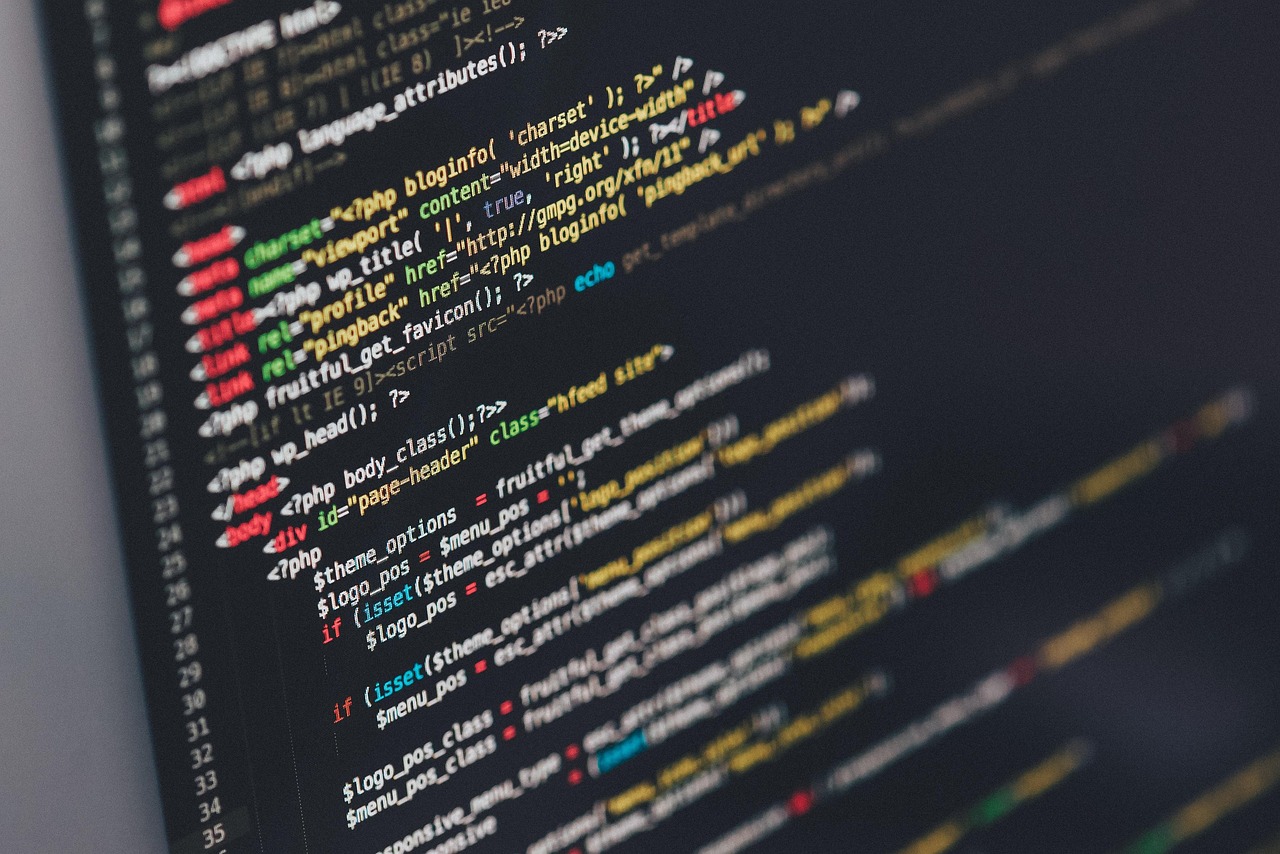 Developer coding mobile applications with a top-rated app development company