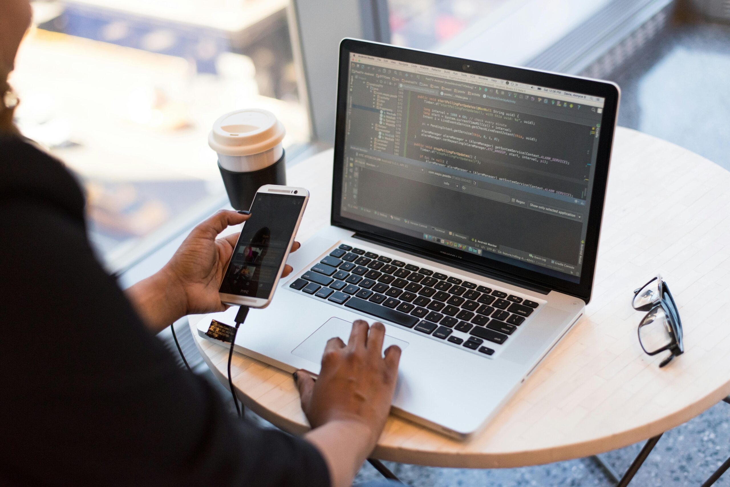 SaaS business team collaborating with an app development company on mobile UI design