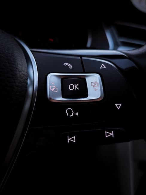 Futuristic car interior showcasing voice commands and smart interface for navigation