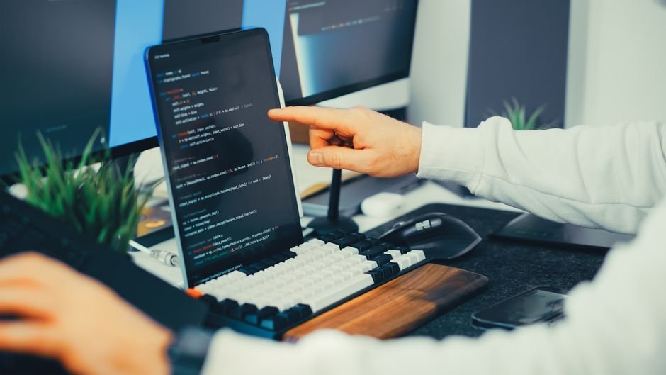 Developer auditing structured database code for seamless Shopify migration