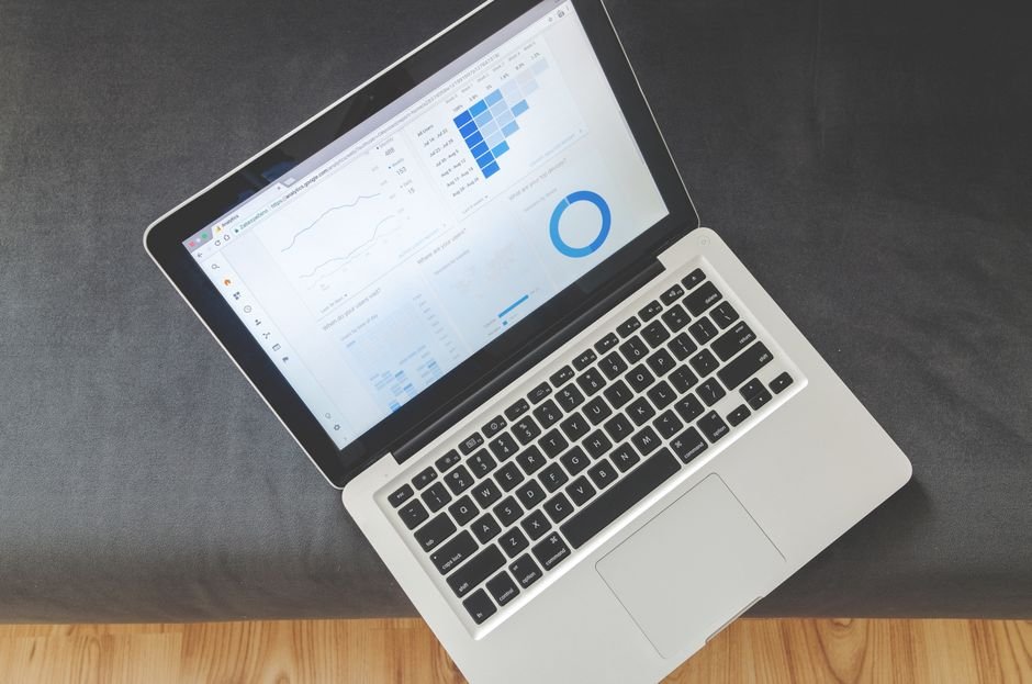 Laptop displaying marketing analytics, essential for understanding podcast audience growth strategies